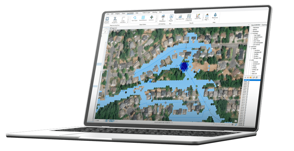 GeoSWMM software interface on laptop