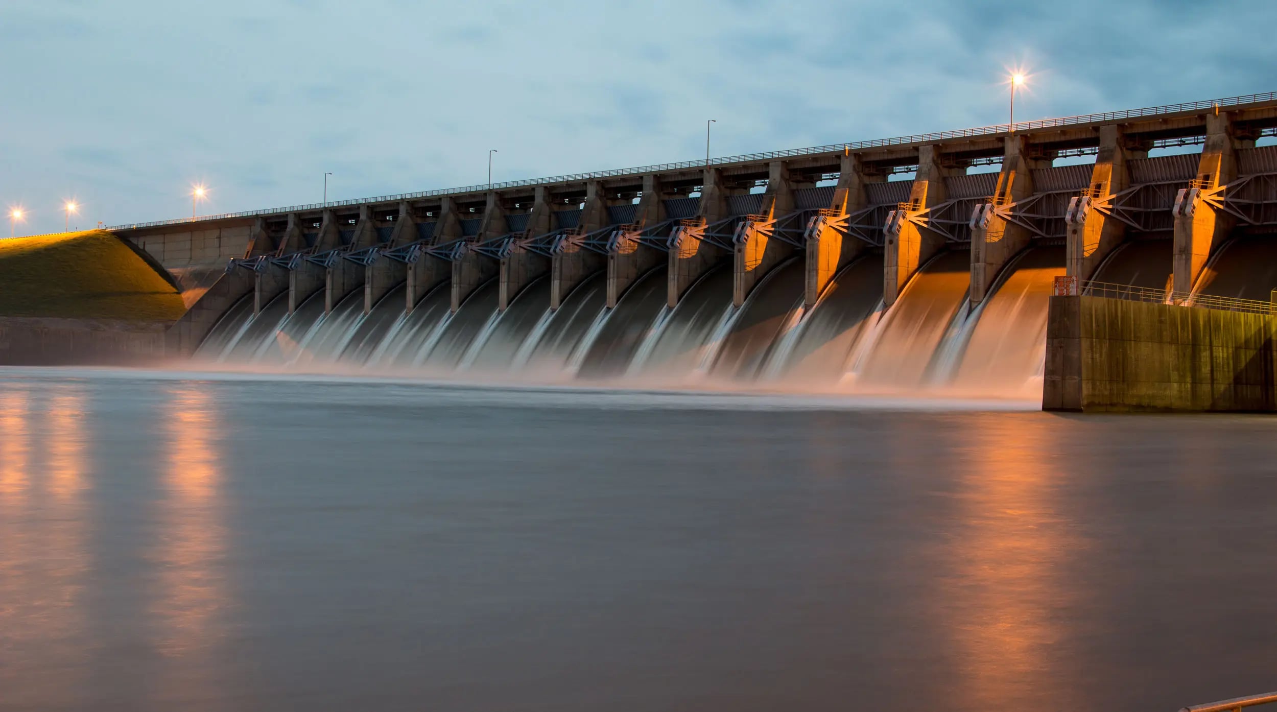 Dam spillways releasing water for flood control and stormwater management​