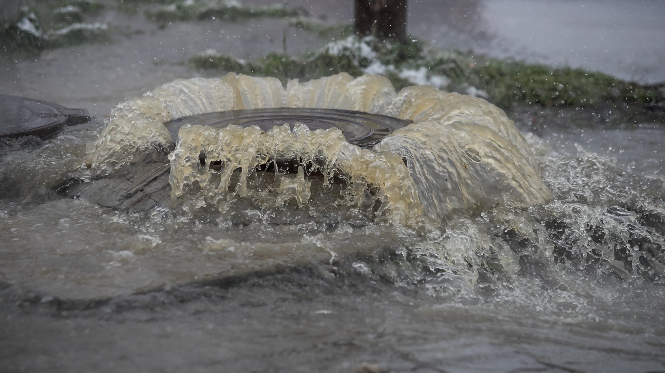 Storm Sewer Inlet Overflow Analysis Urban surface flooding from a storm sewer inlet overflow, showing overland flow paths in a dual drainage system