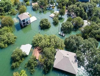 Climate resilience and Flood Risk Flooded community illustrating flood risk assessment and climate resilience with GeoSWMM